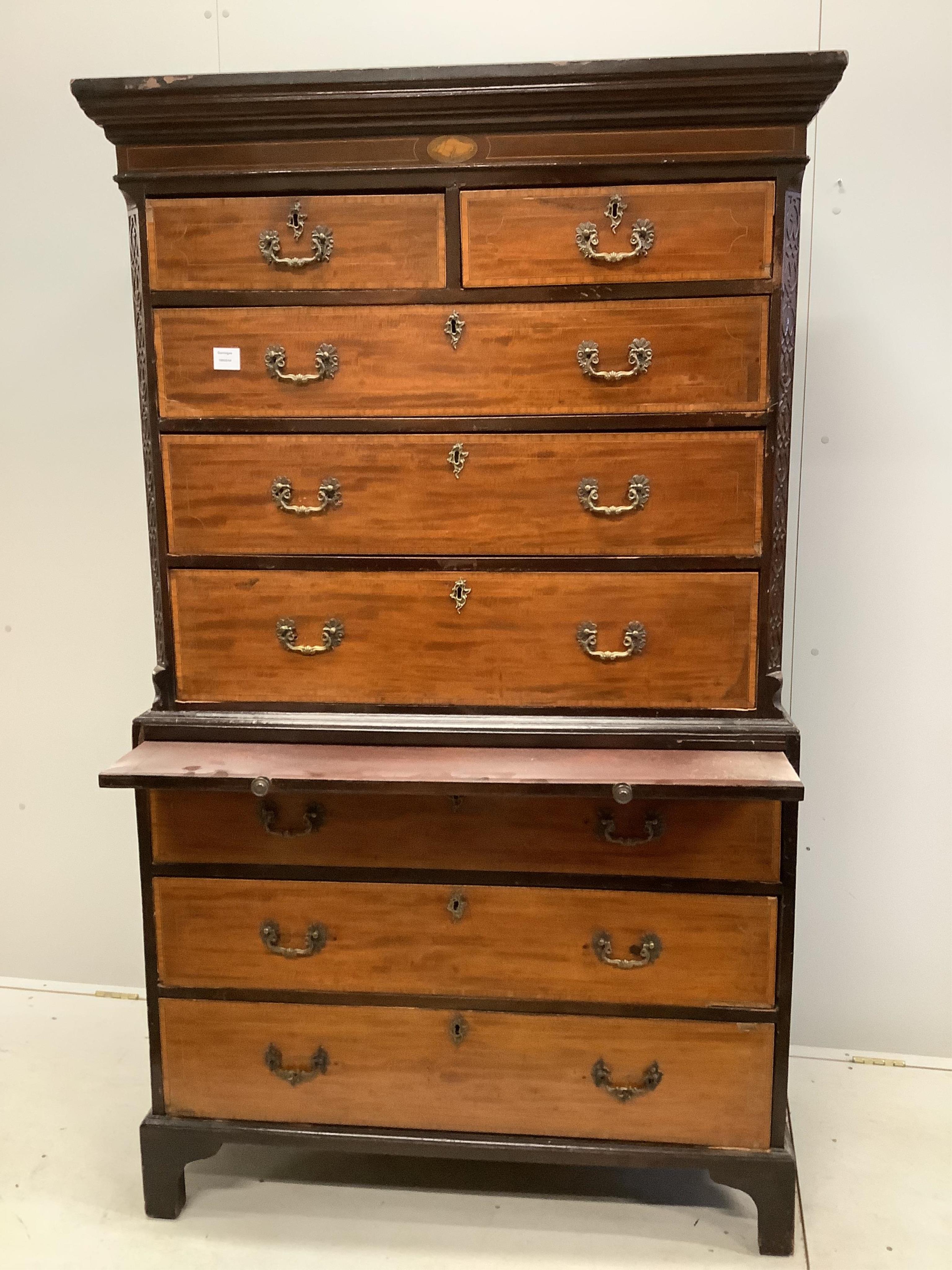 A George III satinwood banded mahogany chest on chest, width 110cm, depth 56cm, height 186cm. Condition - poor to fair